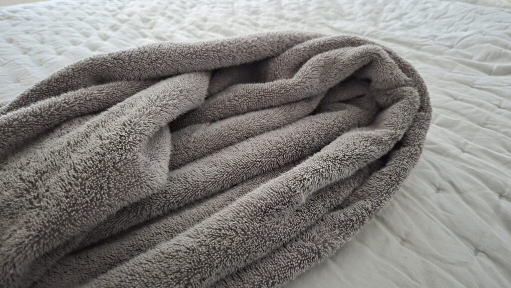 Miracle Made Towels in bed